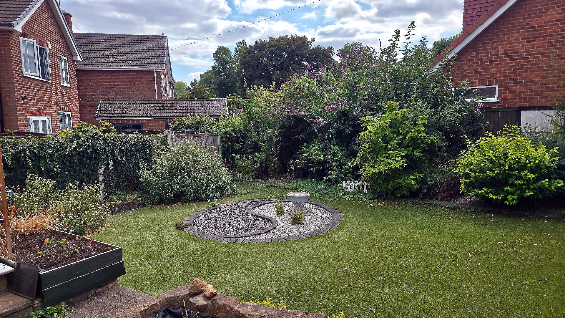 Recent Till The Land garden before overgrowth cut-back